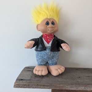 Vintage Doll with Yellow Hair and Black Jacket